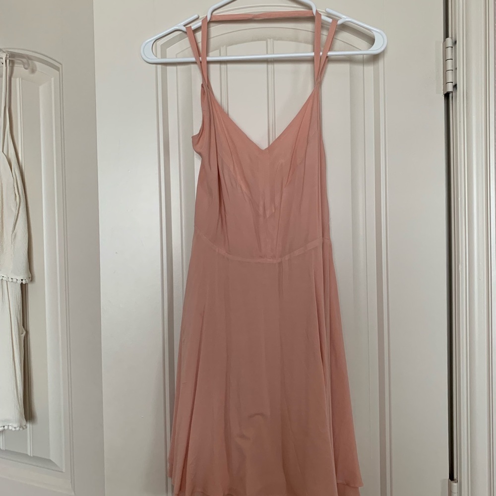 Cute pink low back dress from Urban Outfitters